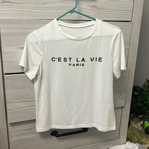 white shirt with black words “c’est la vie paris” worn once perfect condition